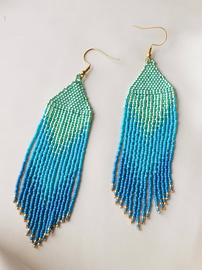 Handmade long fringe earrings with premium turquoise and ocean blue seed beads, elegant lightweight jewelry with a fresh ocean vibe